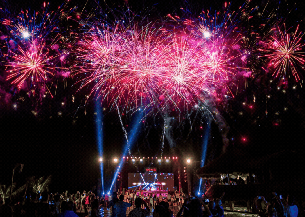 Fireworks above the main stage at Roosterfish Beach Club in Pandawa, Bali, for New Year's Eve