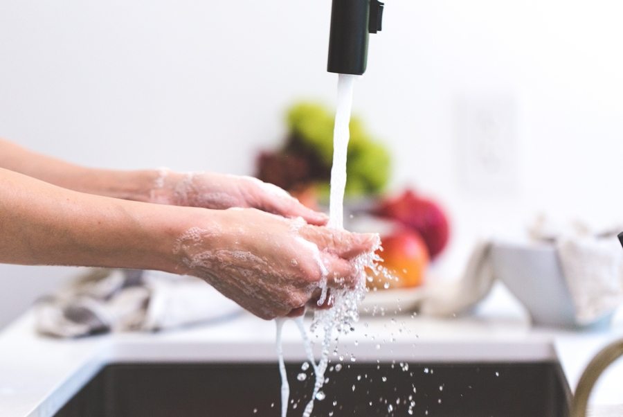 save water washing hands in sink