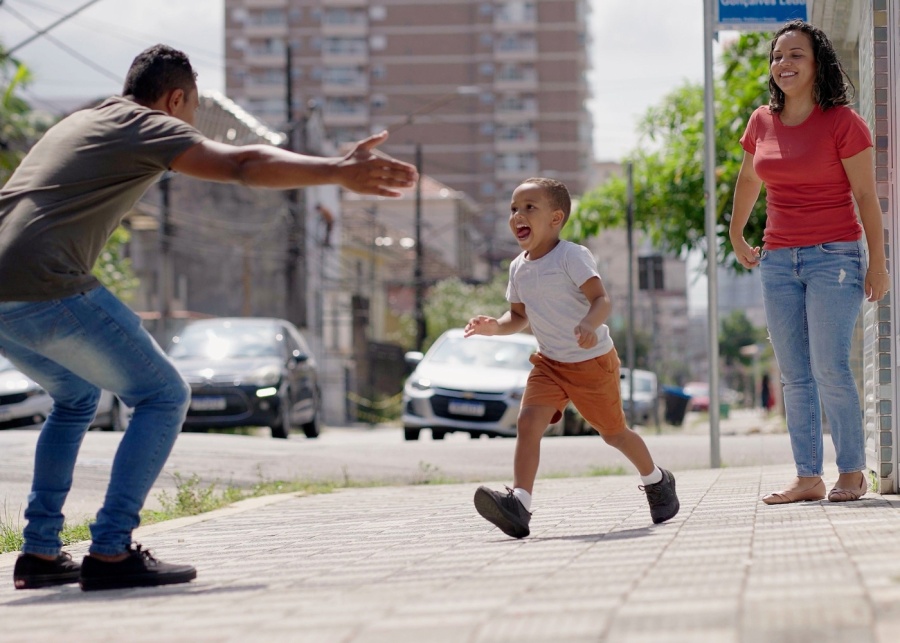 child running to father
