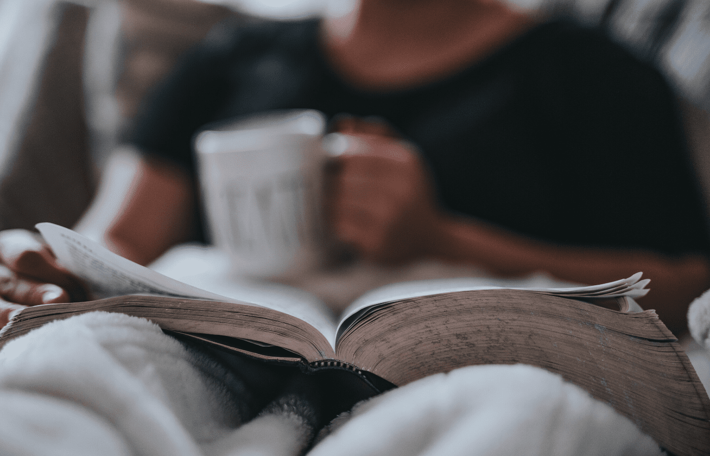 person reading book | stay calm
