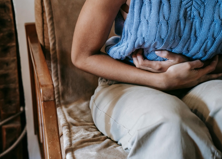 Bioglan Platinum Probiotics - Benefits of probiotics - Person having a stomachache
