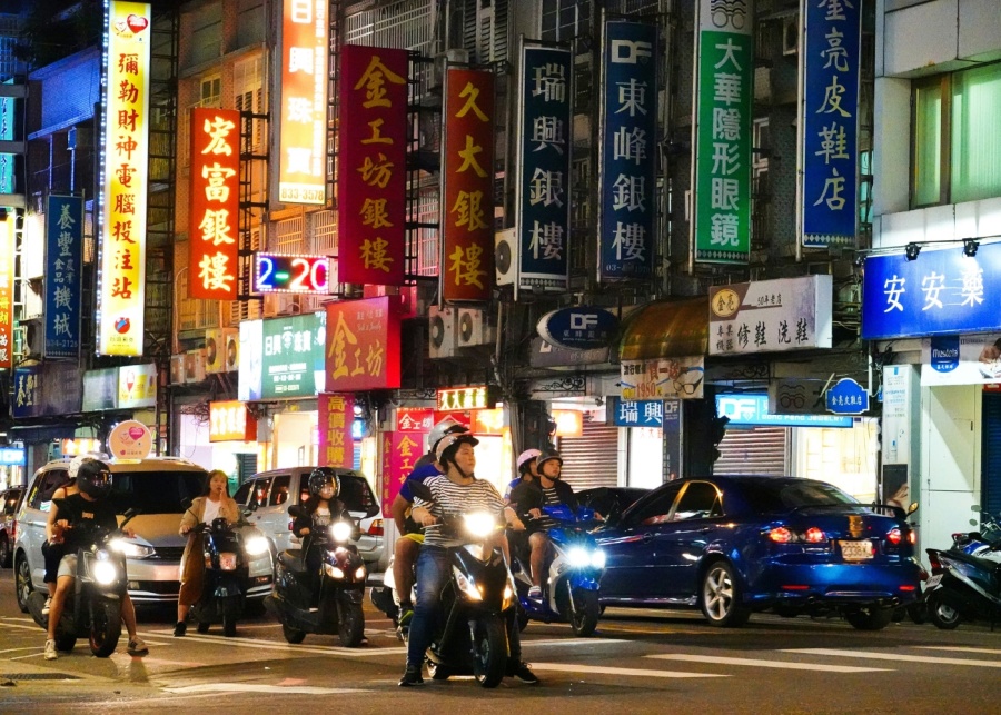 Tainan things to do guide - Night view of the streets with motorcycles and cars